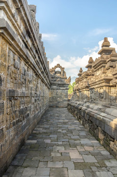 Ancient stone sculptures on the wall in the Borobudur temple in Yogyakarta, Java, Indonesia.