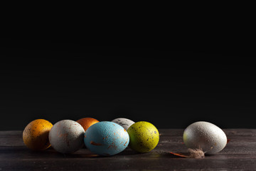 Happy easter! Easter eggs on wooden background