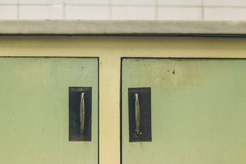 Old green closet doors closed
