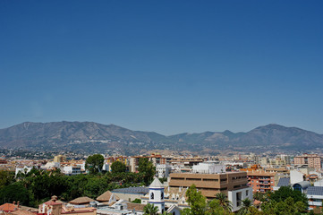 Breathtaking view at the small mediterranean town next to the mountain range.