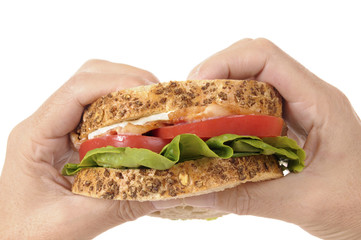 BLT sandwich by holding hands