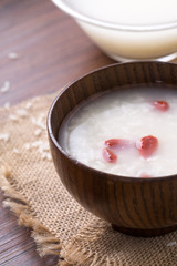 Red goji berries in rice wine, closeup