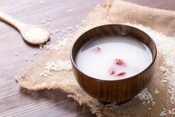 Red goji berries in rice wine, closeup