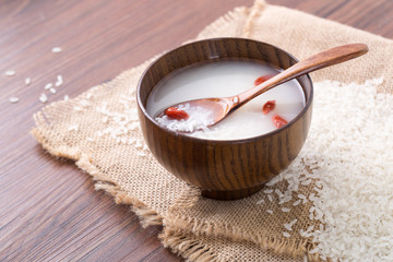 Red goji berries in rice wine, closeup