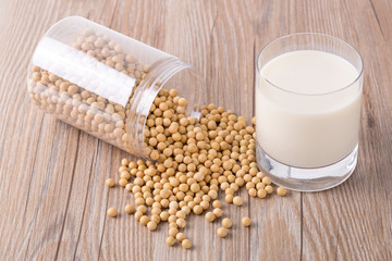 Soybeans and soy milk in a glass. 