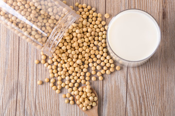 Top view of soybeans and soy milk in a glass