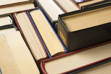 Stack of books background. many books piles.