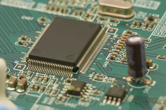 Electronic circuit board, PCB (Printed circuit board) with processor, microchips and glowing digital electronic signals