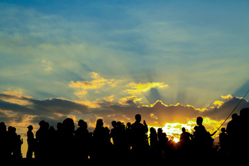 Silhouette of people on a sunset