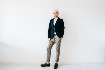 Tilt shift  soft portrait of businessman in expensive italian fashionable clothes standing indoors...