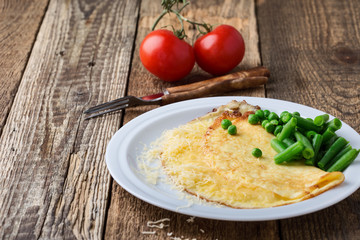  Cheese omelet with green beans and peas