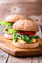 Egg omelet burgers with  green beans and peas