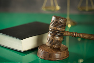 Law and Justice concept. Brown wooden background