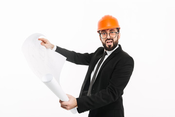 Confused builder engineer wearing helmet holding project.