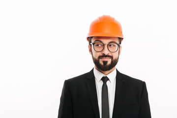 Handsome builder engineer wearing helmet