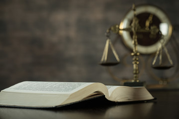 Law and Justice concept. Brown wooden background