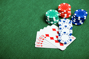 casino chips on a green felt
