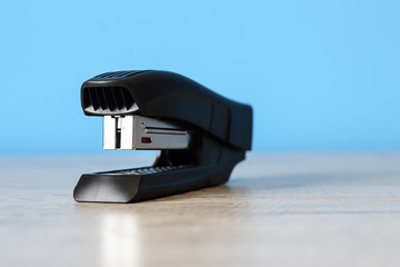 Stapler for office work on the table. Stationery item. Office su