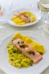 A delicious dish with salmon and cream pores with potatoes. 