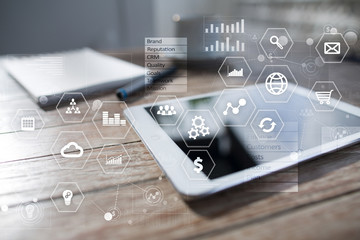 Fototapeta premium Business and technology concept. Graphs and icons on virtual screen background.