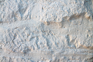  texture of an ancient brick wall covered with white mortar for the background