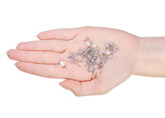 Silver bracelet with pearls in hand