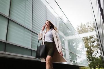 Portrait of young businesswoman going to office