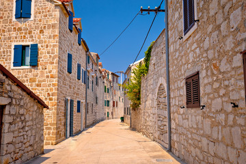 Fototapeta na wymiar Colorful mediterranean stone street of Prvic island