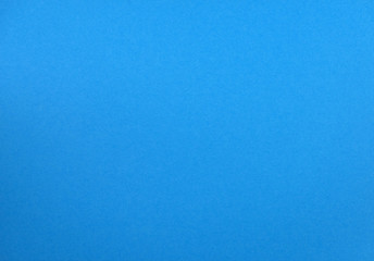 Fototapeta na wymiar Natural light blue colored paper texture
