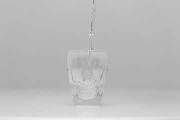 Tumbler is being filled with water