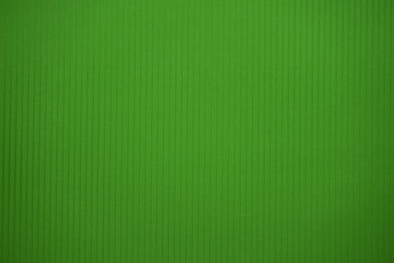 Light green colored corrugated cardboard texture useful as a background