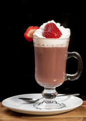 Cold Coffee Milkshake with Strawberry on Plate