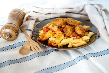 tasty penne with Meat ball and tomato sauce