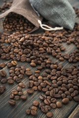 Two bags of roasted black coffee grains
