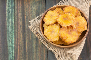 Patacón fried flattened pieces of green plantain (tostón, tachino)