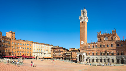 Panorama of Piazza del Campo (Campo square), Palazzo Publico and Torre del Mangia (Mangia tower) in...