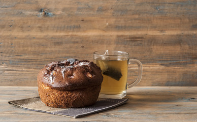 Coffee cup and cake with sugar icing