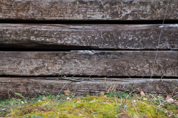 Fototapeta premium Set of old wooden railway sleepers as background, texture. Rough wooden background.