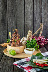 Naklejka na ściany i meble grill ox tongue with herbs, Esan food, Thai Food,