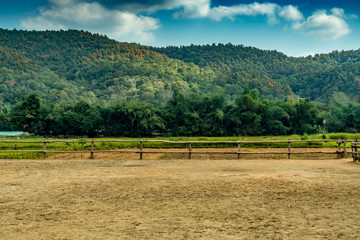 Sand and wooden fence