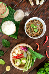 Oxtail soup in white dish on brown wood, Delicious Esan Thai food, Isan food