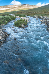Mountains and river in Jotunheimen National Park, Norway