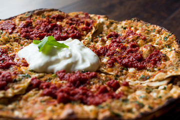 Turkish Kayseri Style Layers of Flat Bread with Minced Meat and Yogurt Yaglama.