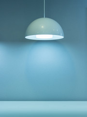 brick concrete room with ceiling lamps