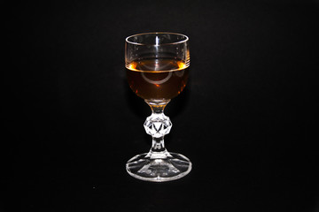 wineglass isolated on black background