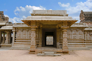Carving details on the outer wall of Hazara Rama Temple. Hampi, Karnataka, India.