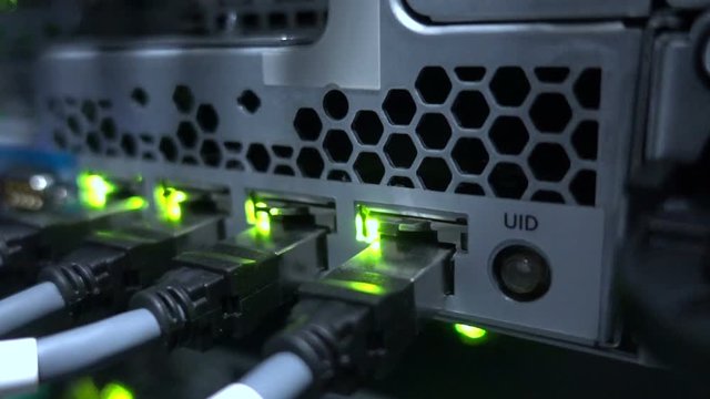 Flashing lamp. Rack Mounted Servers In A Server Room, Server rack audio cable. Severs computer in a rack at the large data center. 