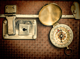 old suitcase  and compass
