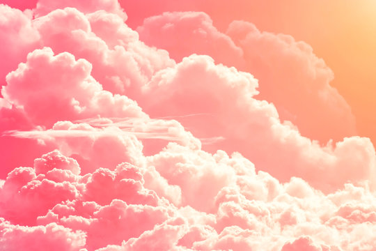 Pink red clouds on sky background