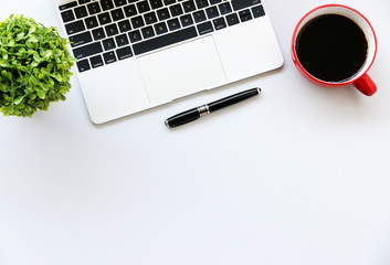business Concept,Working with Laptop computer,Coffee,keyboard,pen and spectacles on table background,Top view,flat lay